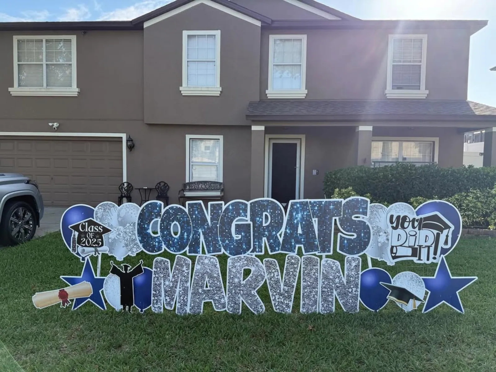 Graduation yard greeting display